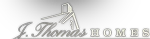 J. Thomas Homes logo